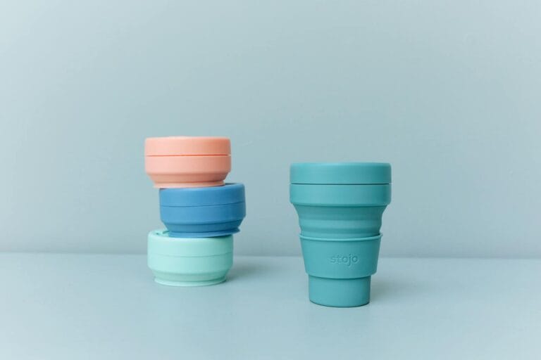 Colorful reusable and collapsible cups promoting sustainability and zero waste living. bpa free?