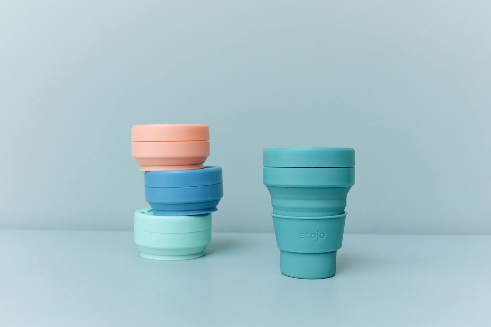 Colorful reusable and collapsible cups promoting sustainability and zero waste living. bpa free?