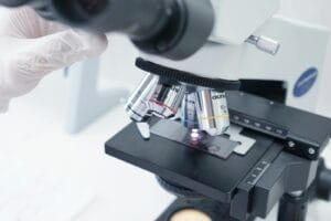 Detailed view of a microscope in a laboratory used in scientific research. Pesticide Eye Irritation Test.